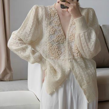 Jolie - Pull en maille élégant avec boutons en nacre